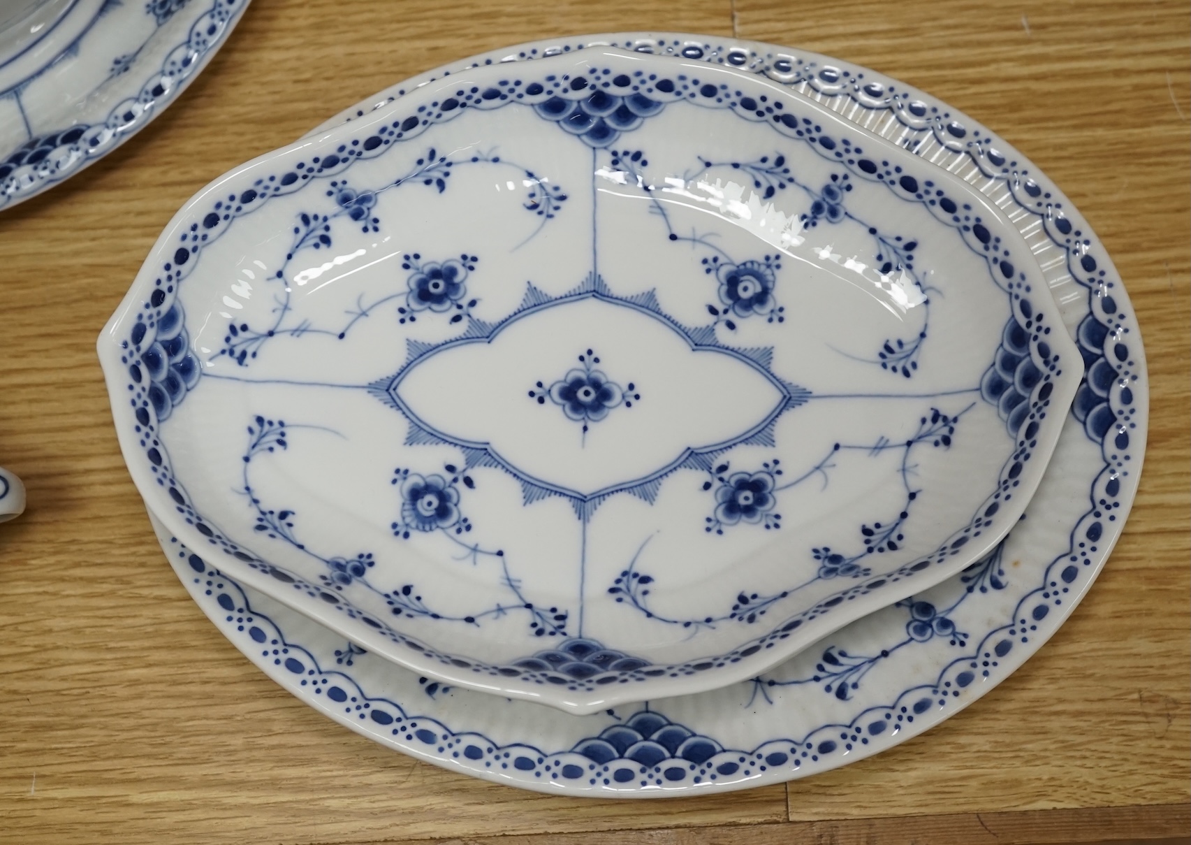 A collection of Royal Copenhagen Onion pattern blue and white dinnerware. Condition - mostly good